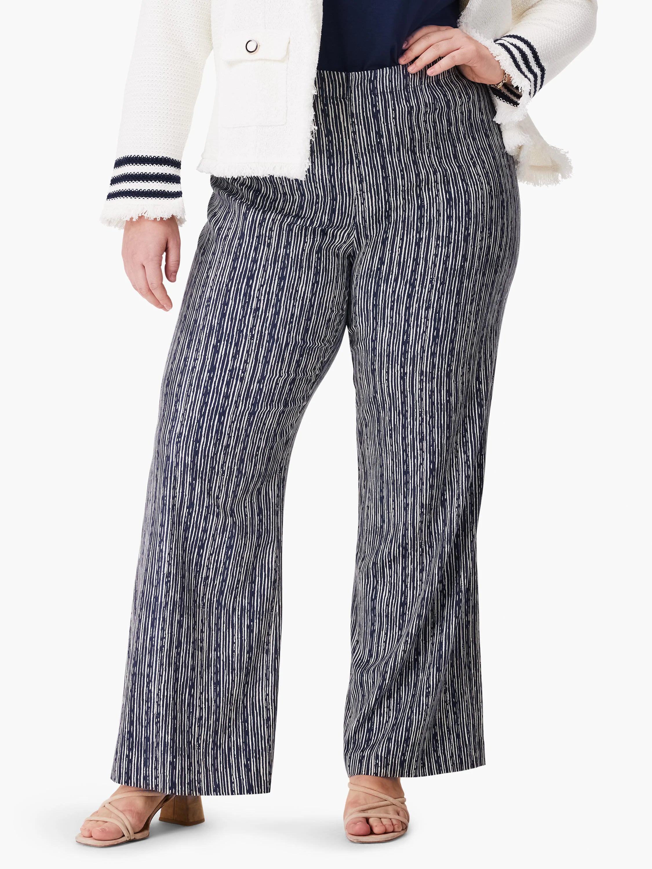 Wide-leg pants; navy and off-white vertical stripes.