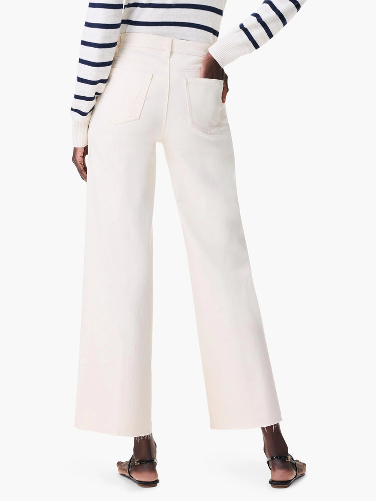 Cream wide-leg jeans with a high waist, visible back pockets, and raw, frayed hems.