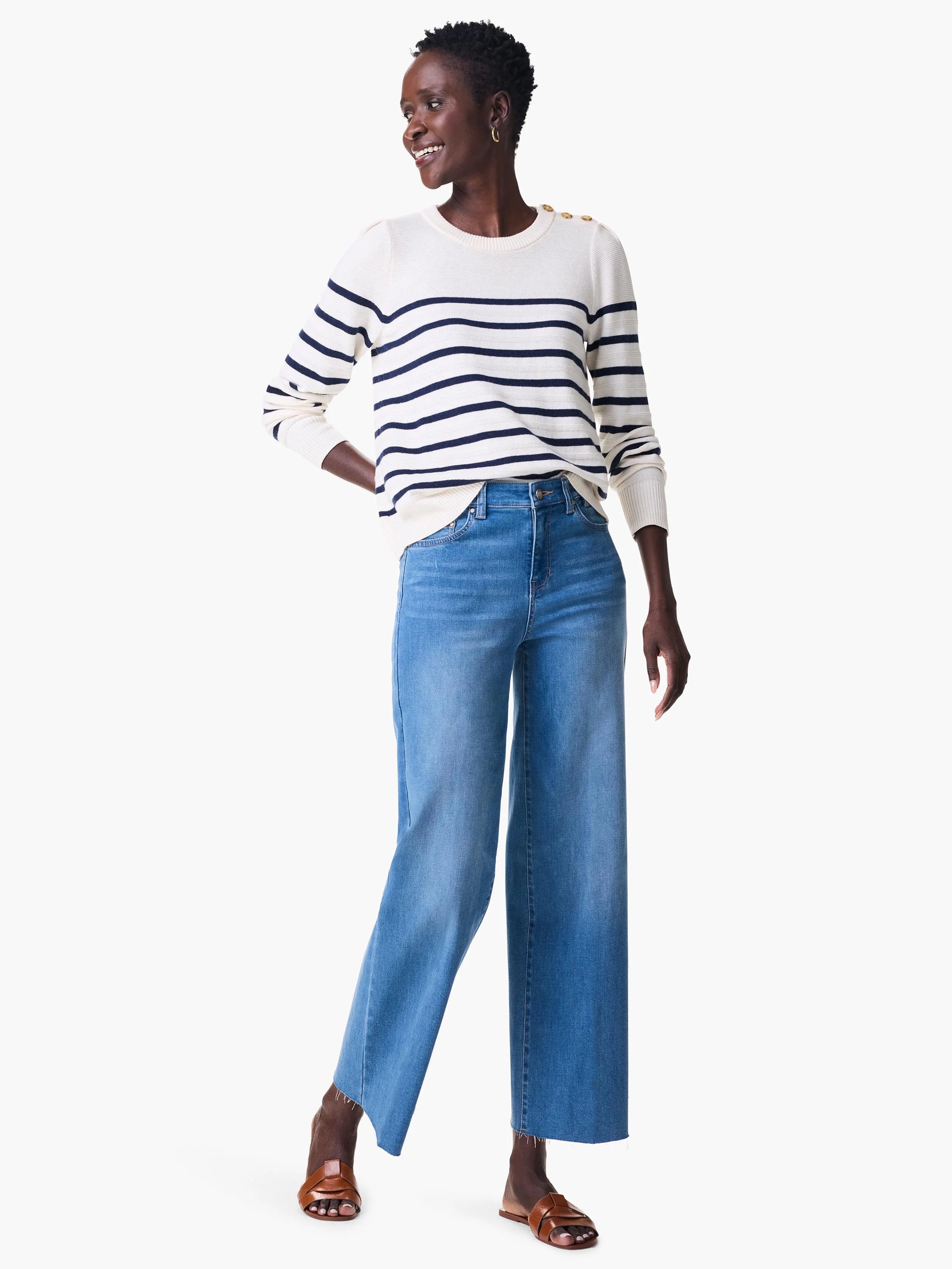 Medium blue wide-leg cropped jeans with frayed hems.