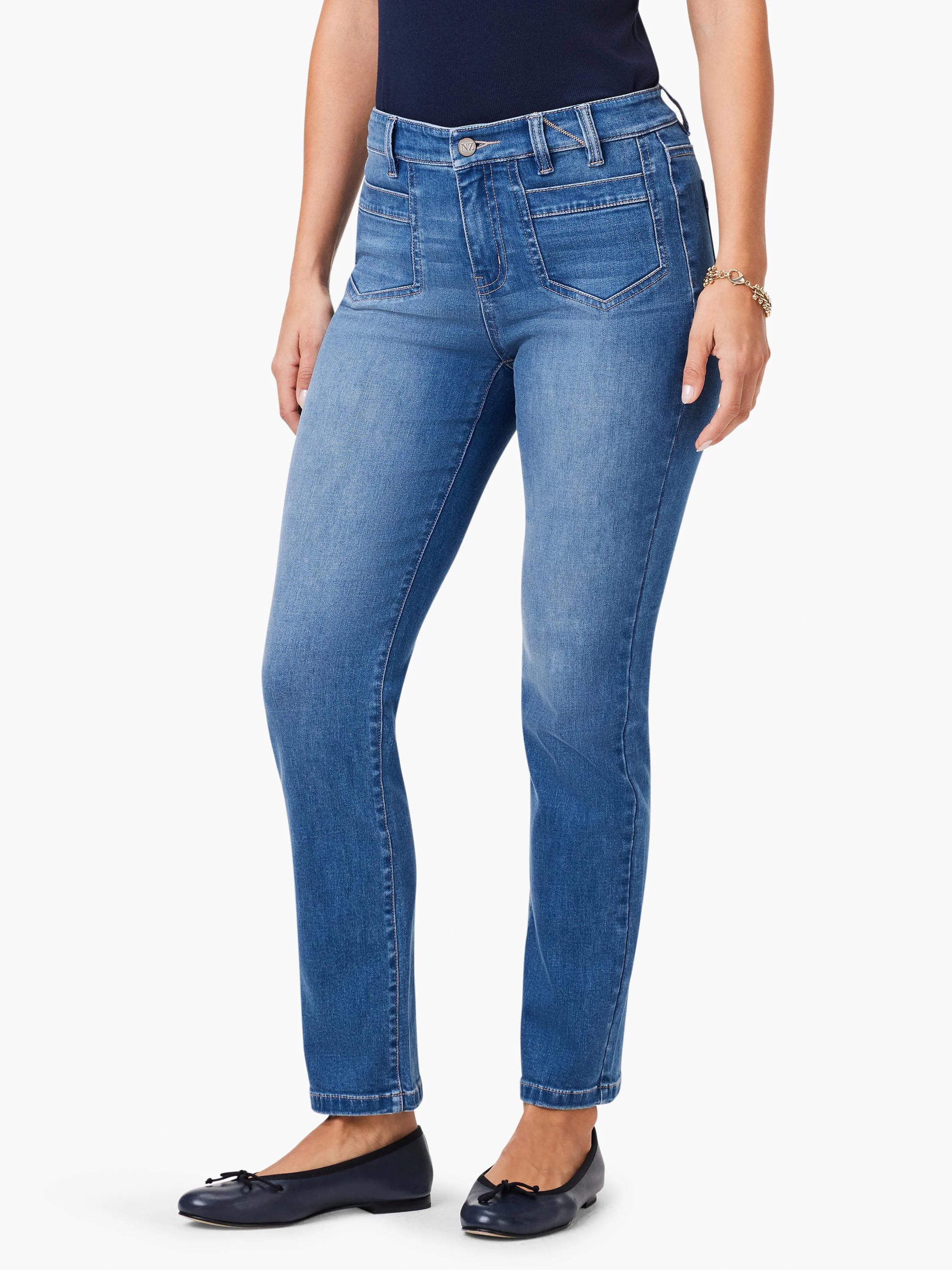 Mid-rise, straight-leg, medium blue denim jeans with large front patch pockets and a silver-toned button closure.