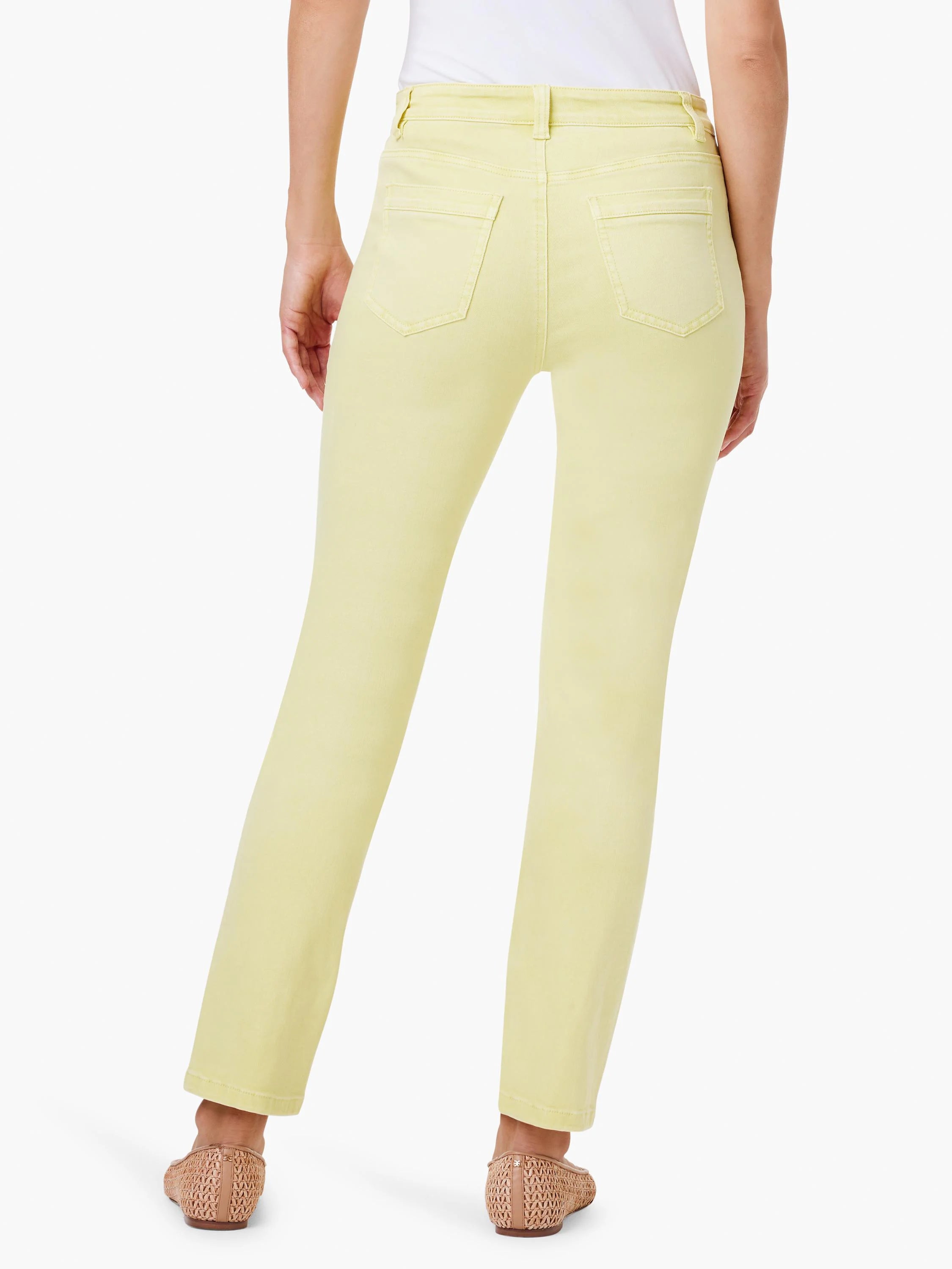 Pale yellow mid-rise straight jeans, back view, with two patch pockets and belt loops.
