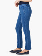 Medium blue straight ankle denim trousers with side seam pockets and raw, frayed ankle hems.