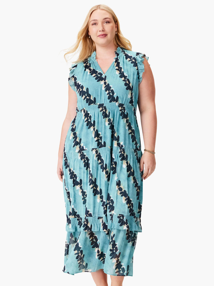 Teal midi dress with dark-blue/black and cream leaf print. Sleeveless, V-neck, tiered skirt, ruffled neckline and hem.