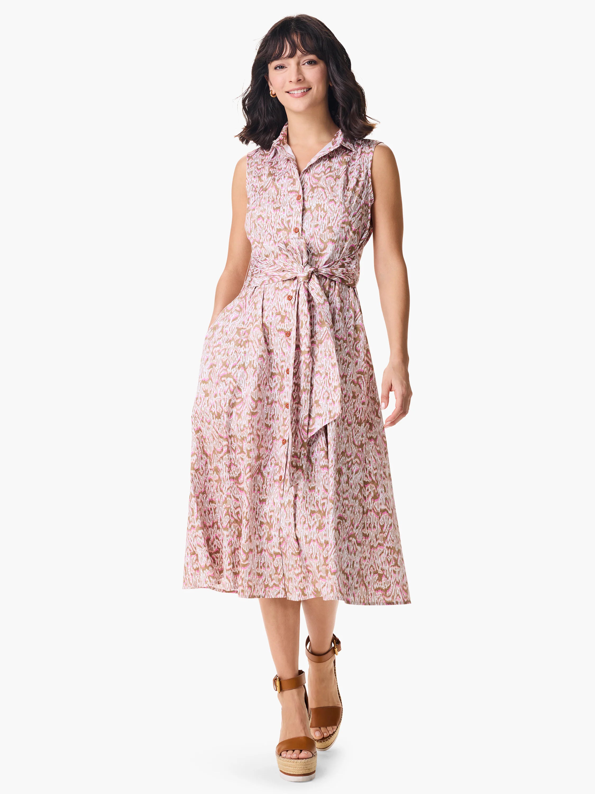 Sleeveless midi shirt dress with an abstract animal print in pink, brown, and white. Features a belted waist and pockets.