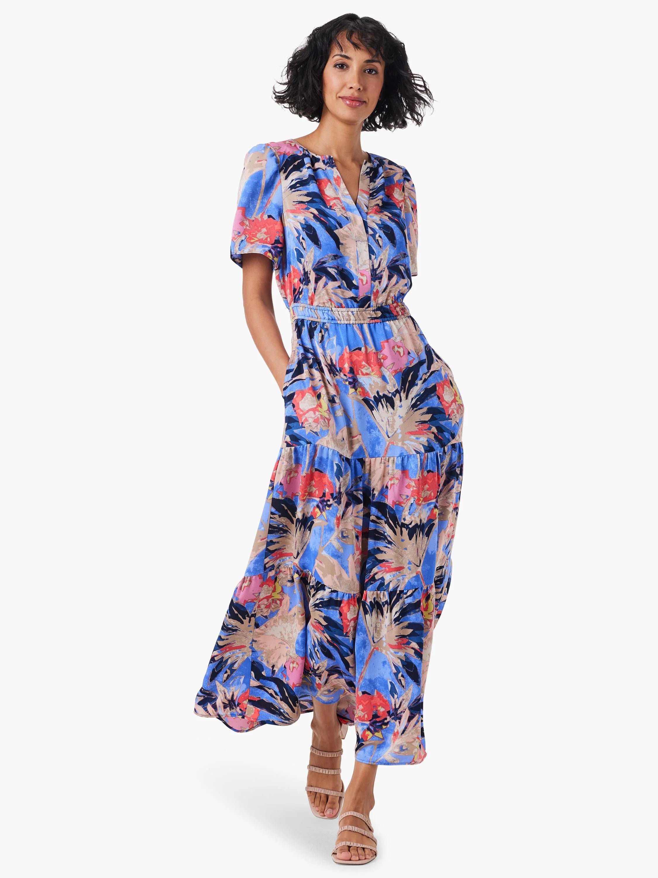 Maxi dress, blue background, red, pink & beige floral print. Short sleeves, tiered skirt.