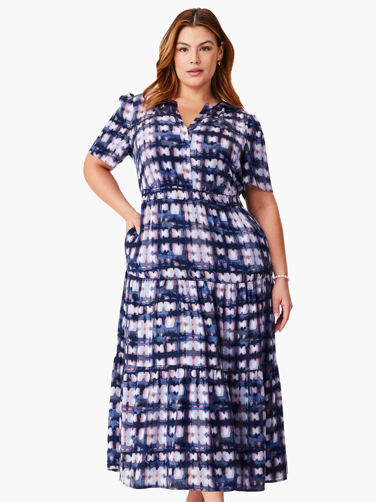 Midi dress, dark blue, lavender, and peach tie-dye pattern. Short sleeves, collared neckline, tiered skirt, and pockets.