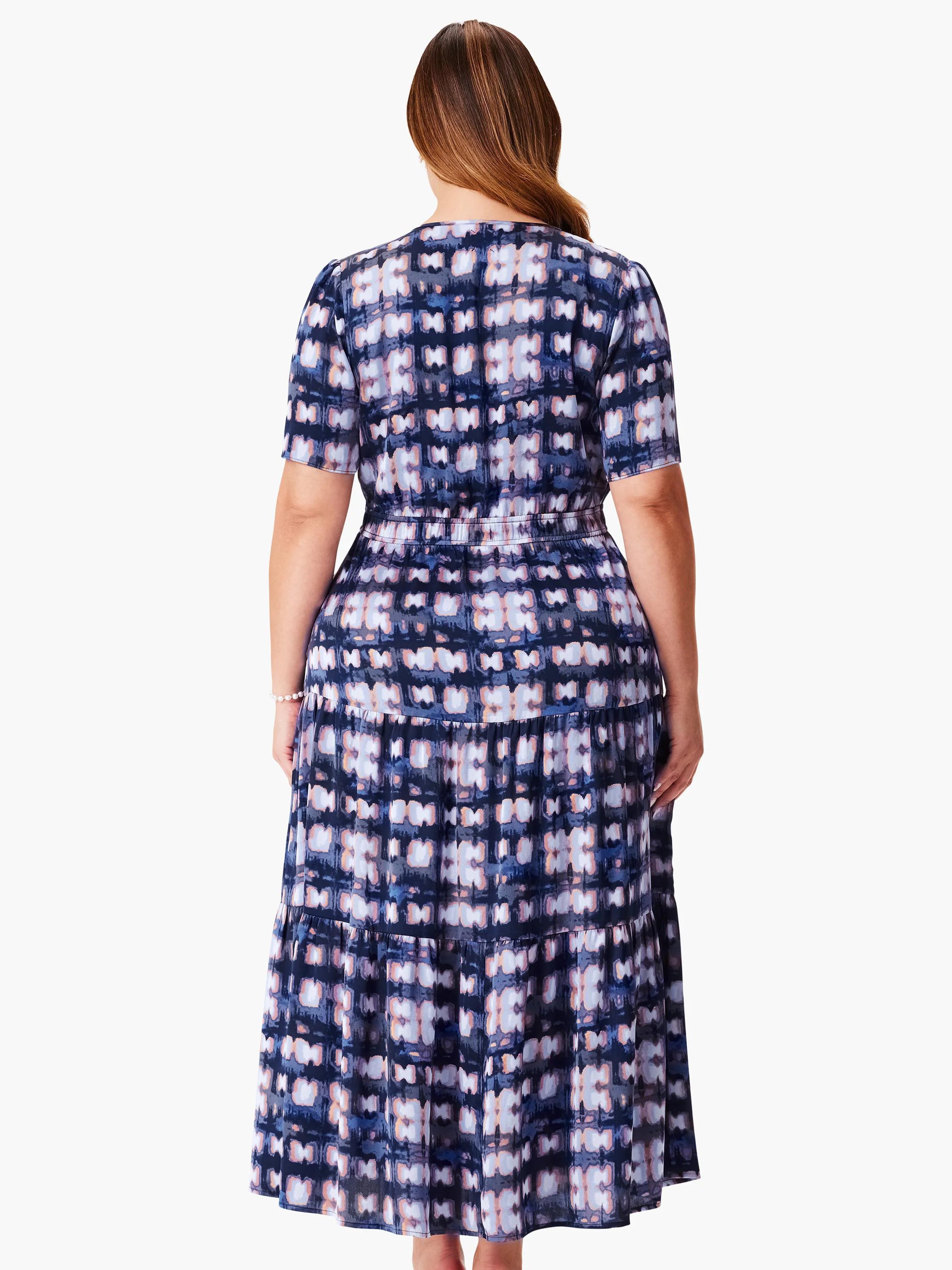 Here's alt text under 125 characters:
"Midi dress, dark blue, lavender, and beige abstract print. Short sleeves, tiered...