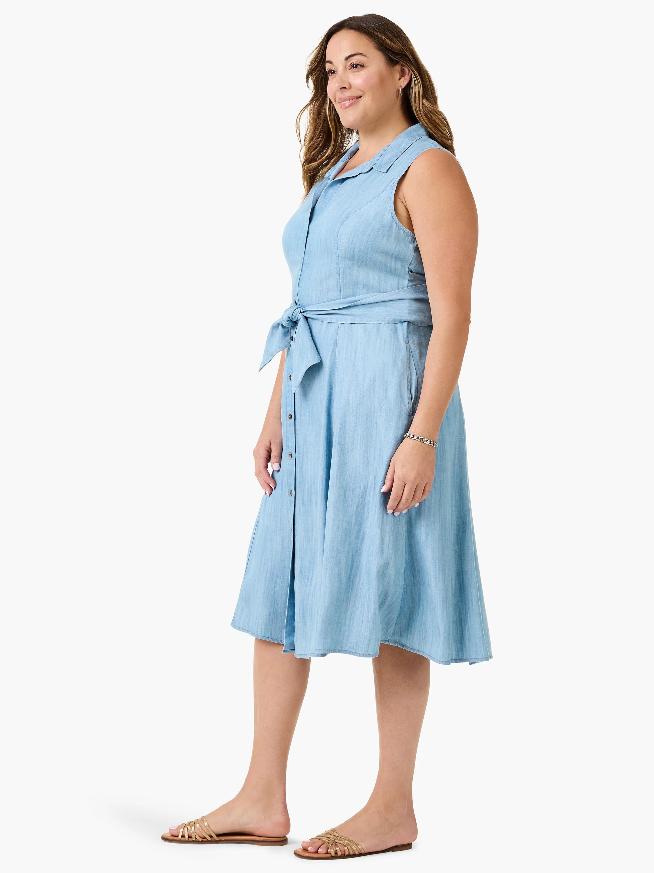 Light blue denim shirtdress, sleeveless, belted waist, knee-length, button front.