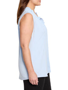 Light blue sleeveless tank with ruffles around the collar.