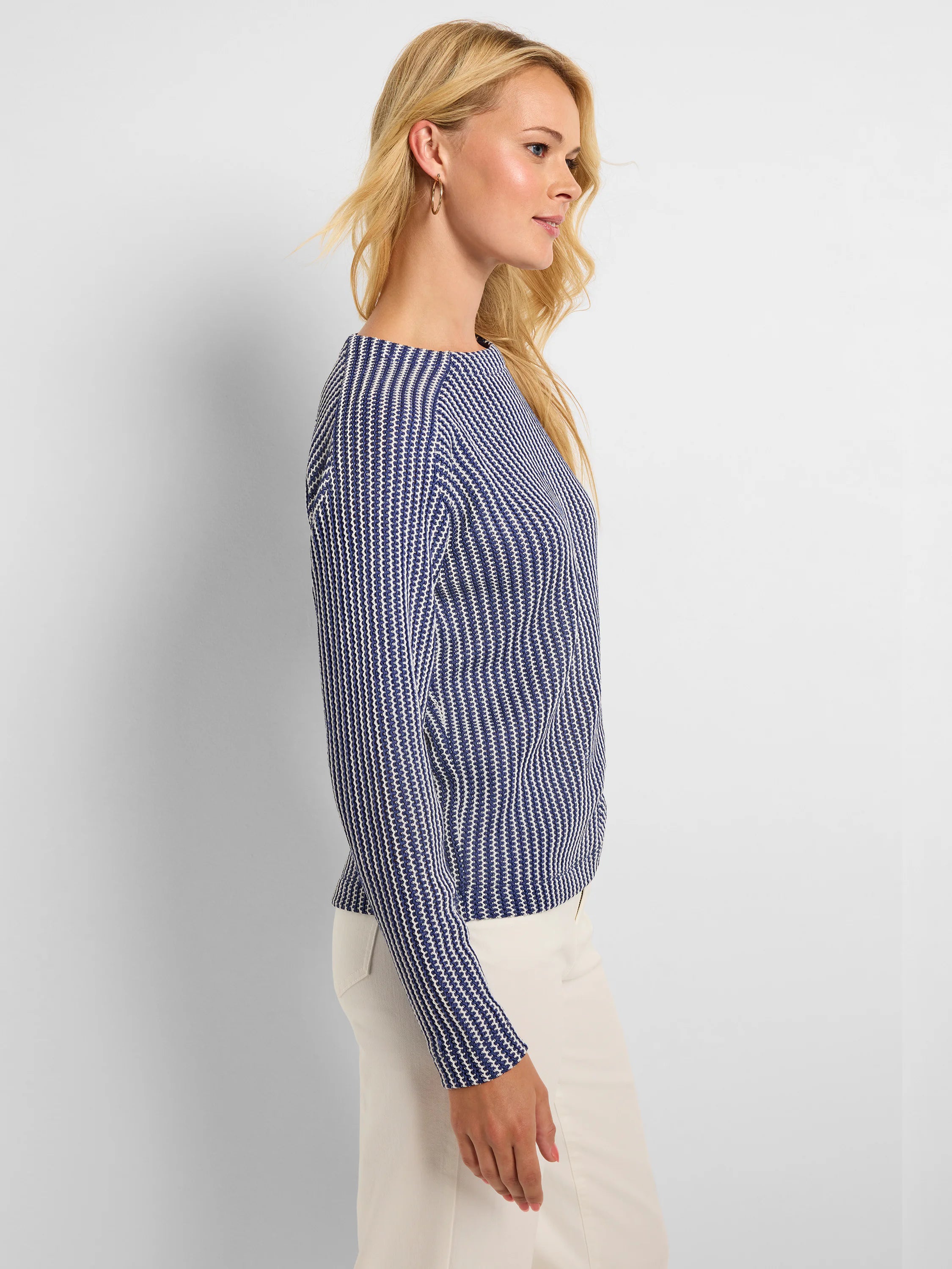 Navy blue & white long-sleeve knit top with a zig-zag pattern.