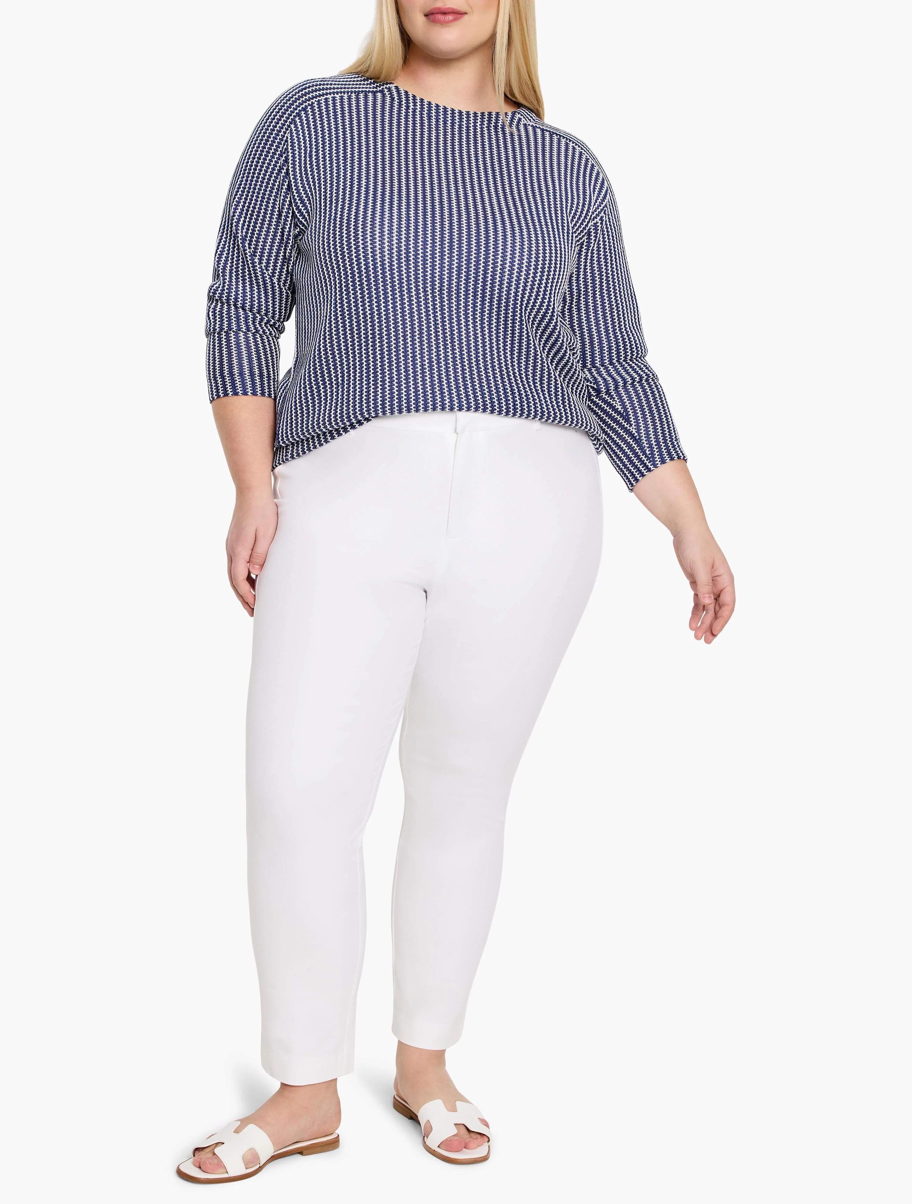 Navy and white zig-zag knit top with 3/4 sleeves and a crew neck.