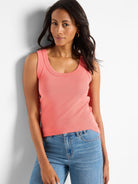 Peach ribbed knit scoop tank, sleeveless.