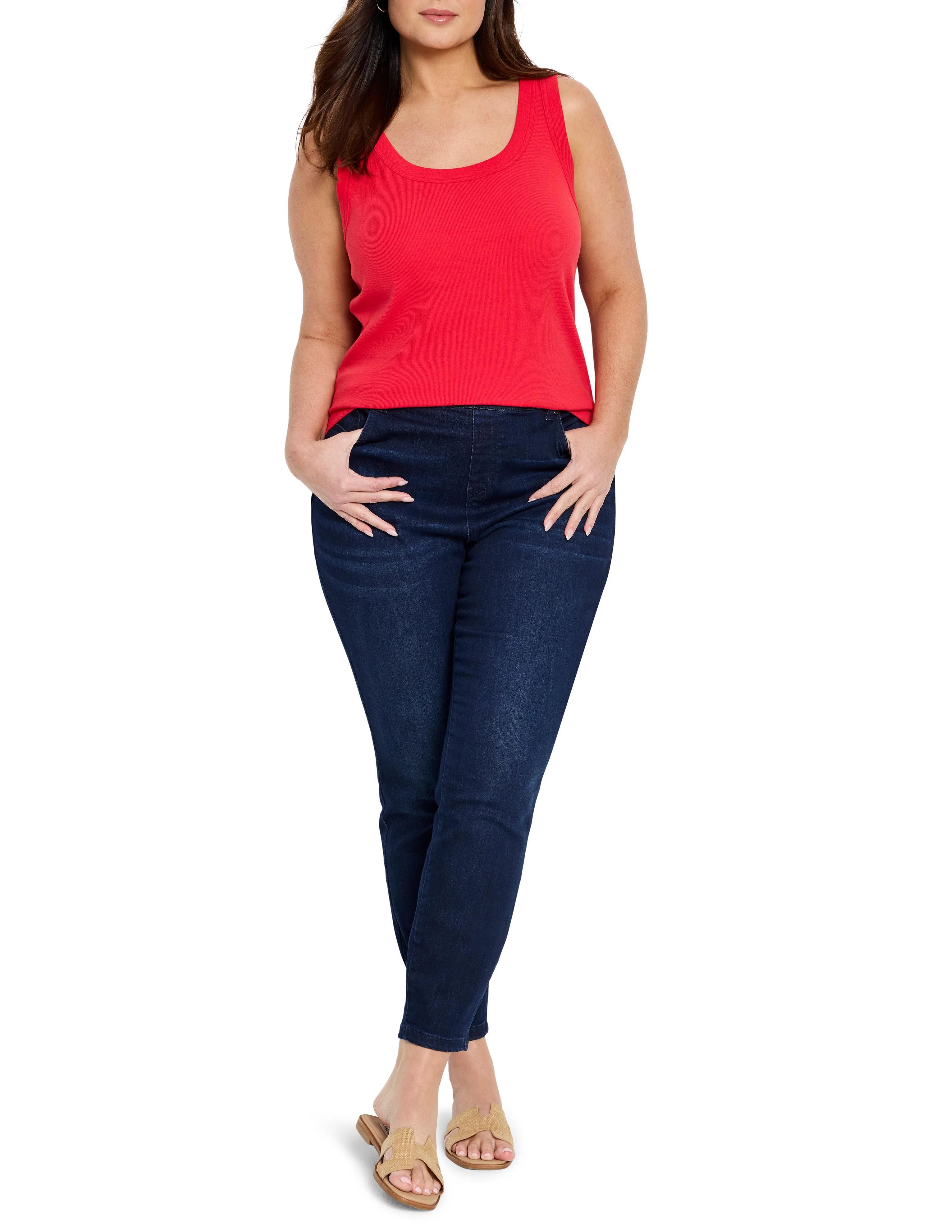 Red ribbed scoop neck tank top worn by a model, hemmed at hips.