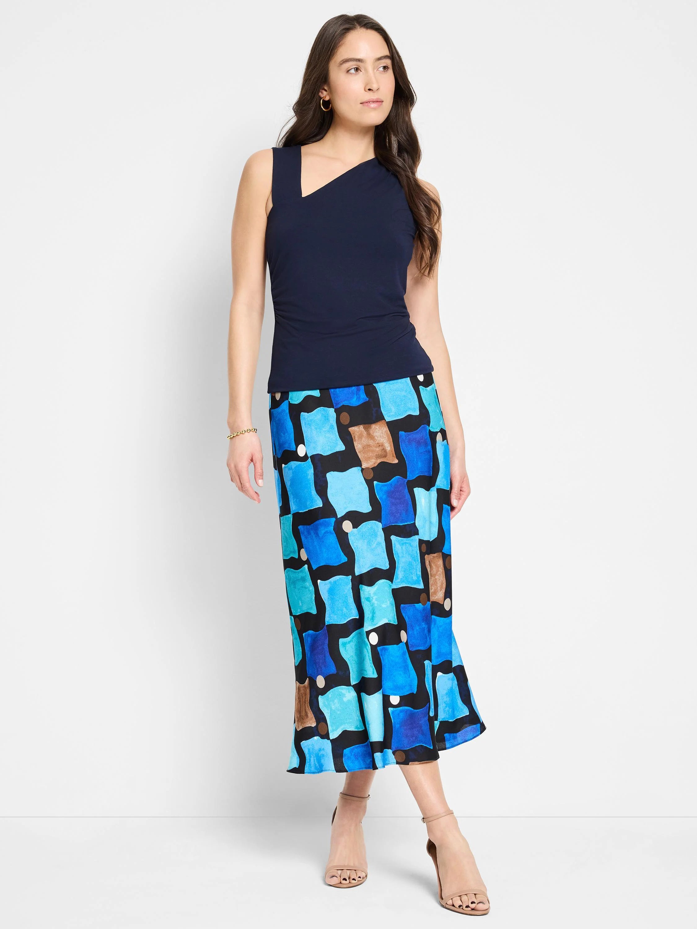 Navy asymmetrical tank top with a diagonal neckline.