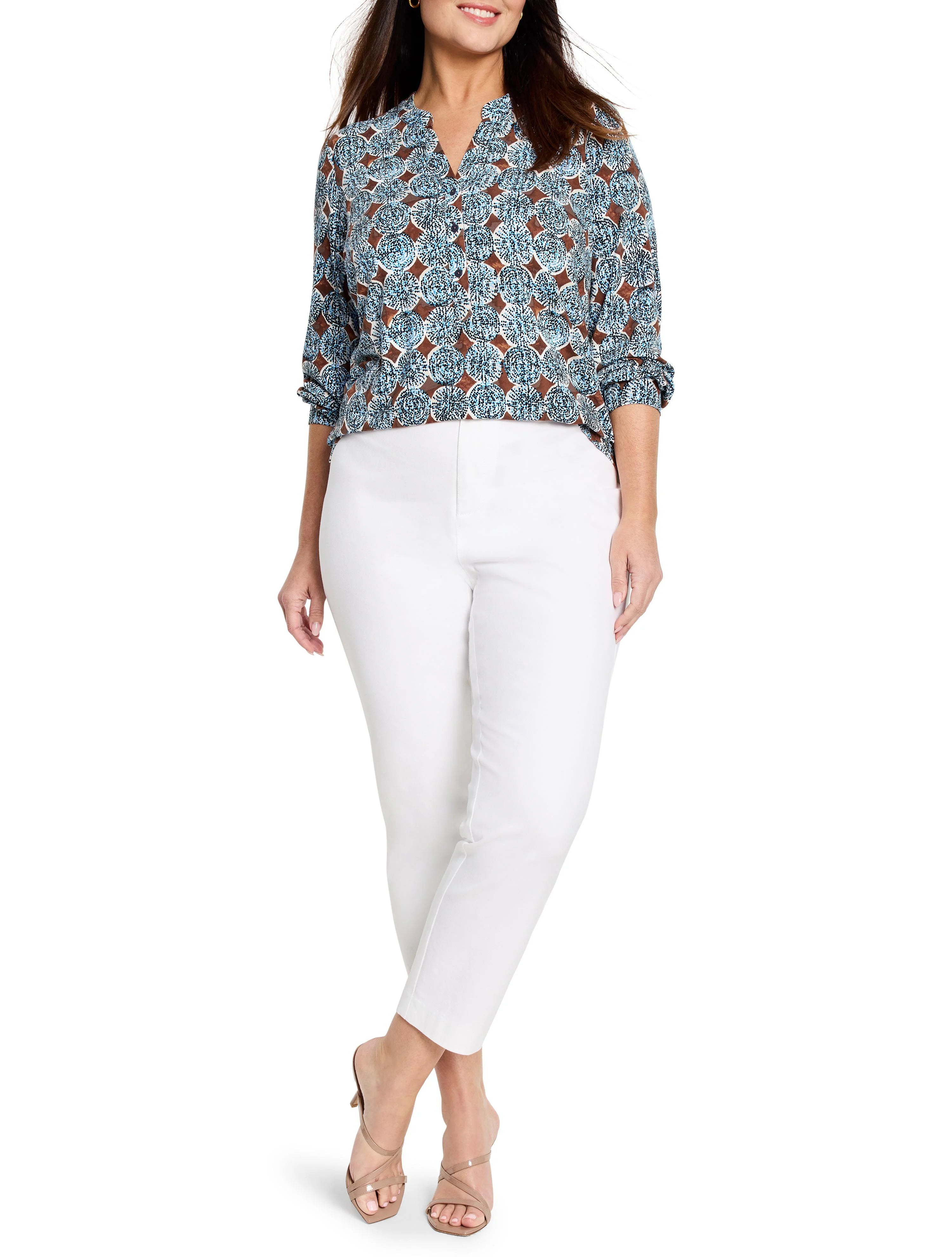 Light blue, teal, white, and brown knit top with a sand dollar pattern. Features a V-neck and 3/4 sleeves.