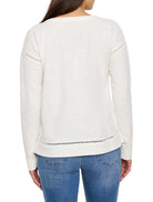 Off-white textured long-sleeve top with open-knit detail at shoulders and hem. Seen from back on model.