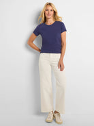 Navy blue knit crew neck t-shirt with short sleeves.