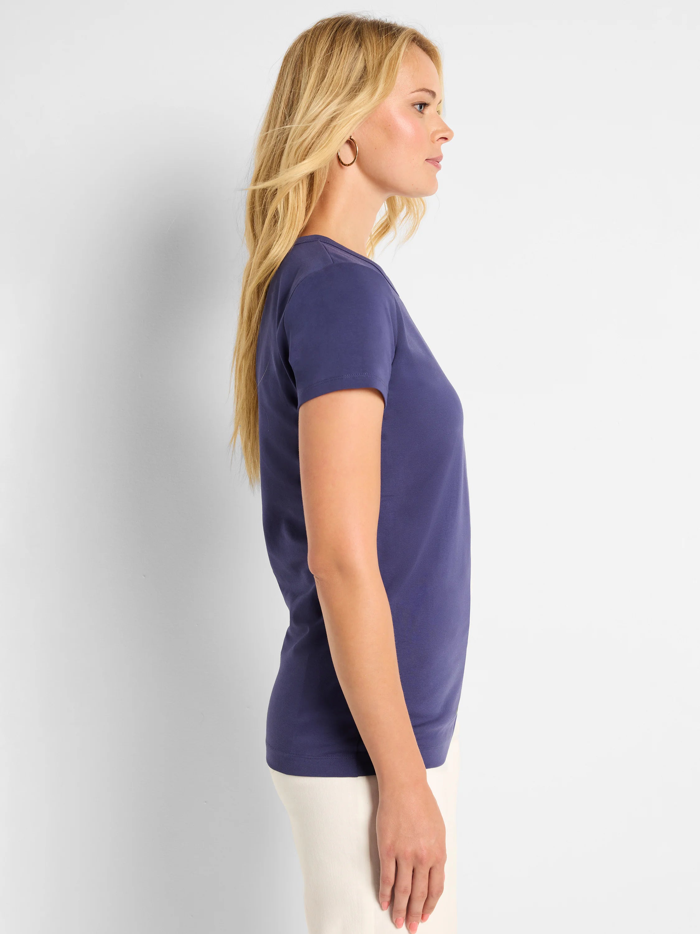 Navy blue Perfect Knit Crew Neck T-Shirt on a model, featuring short sleeves and a relaxed fit.