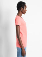Coral pink, short-sleeved t-shirt with a relaxed fit.