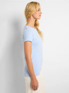 Light blue crew neck t-shirt with short sleeves, appearing smooth and fitted on the model.