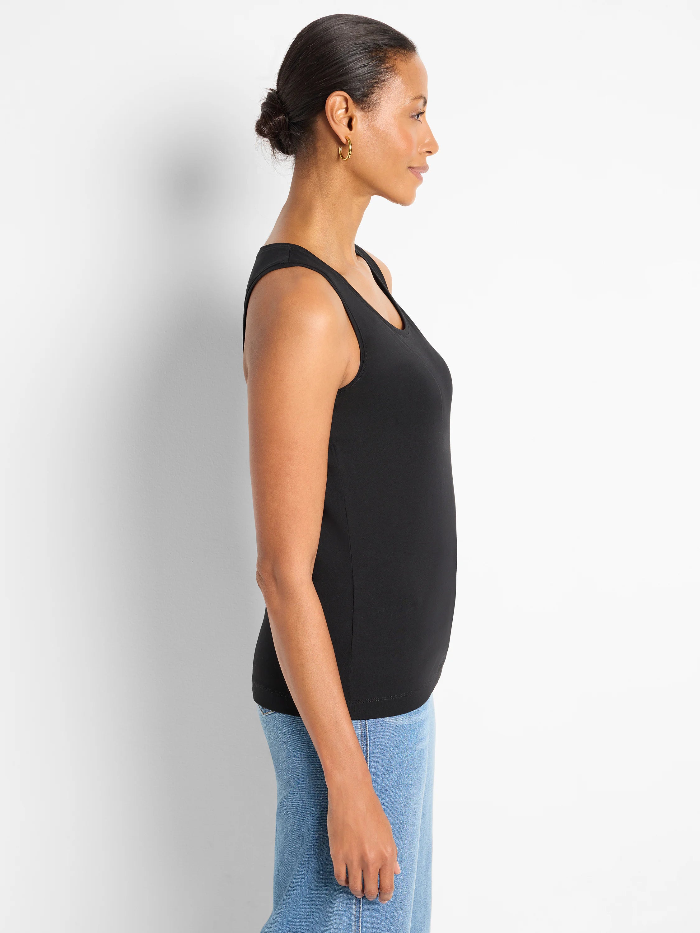 Black knit tank top with scoop neck.