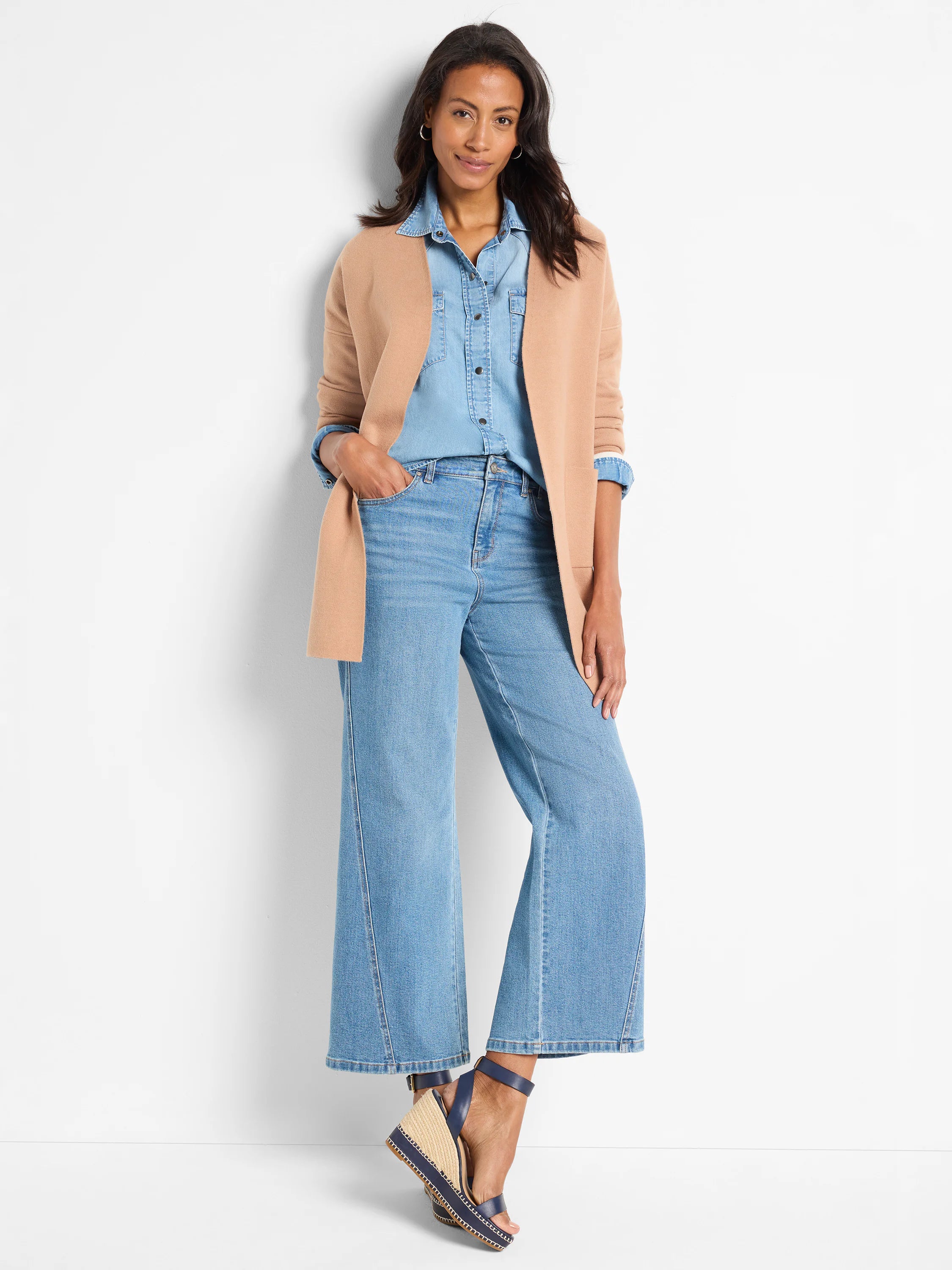 Light tan knit jacket, reversible, open-front style with long sleeves, mid-thigh length.