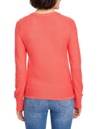Coral garter knit crew neck sweater, back view, with ribbed neckline and cuffs.