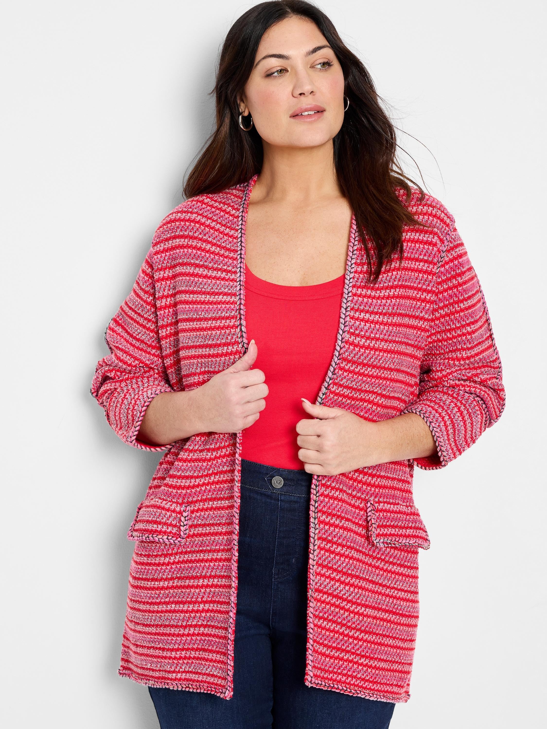Red and pink striped cardigan with three-quarter sleeves and dark trim. Open front.