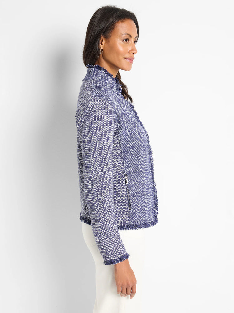Here's alt text under 125 characters:
Blue and white knit jacket. Herringbone pattern, notched collar, fringed edges,...