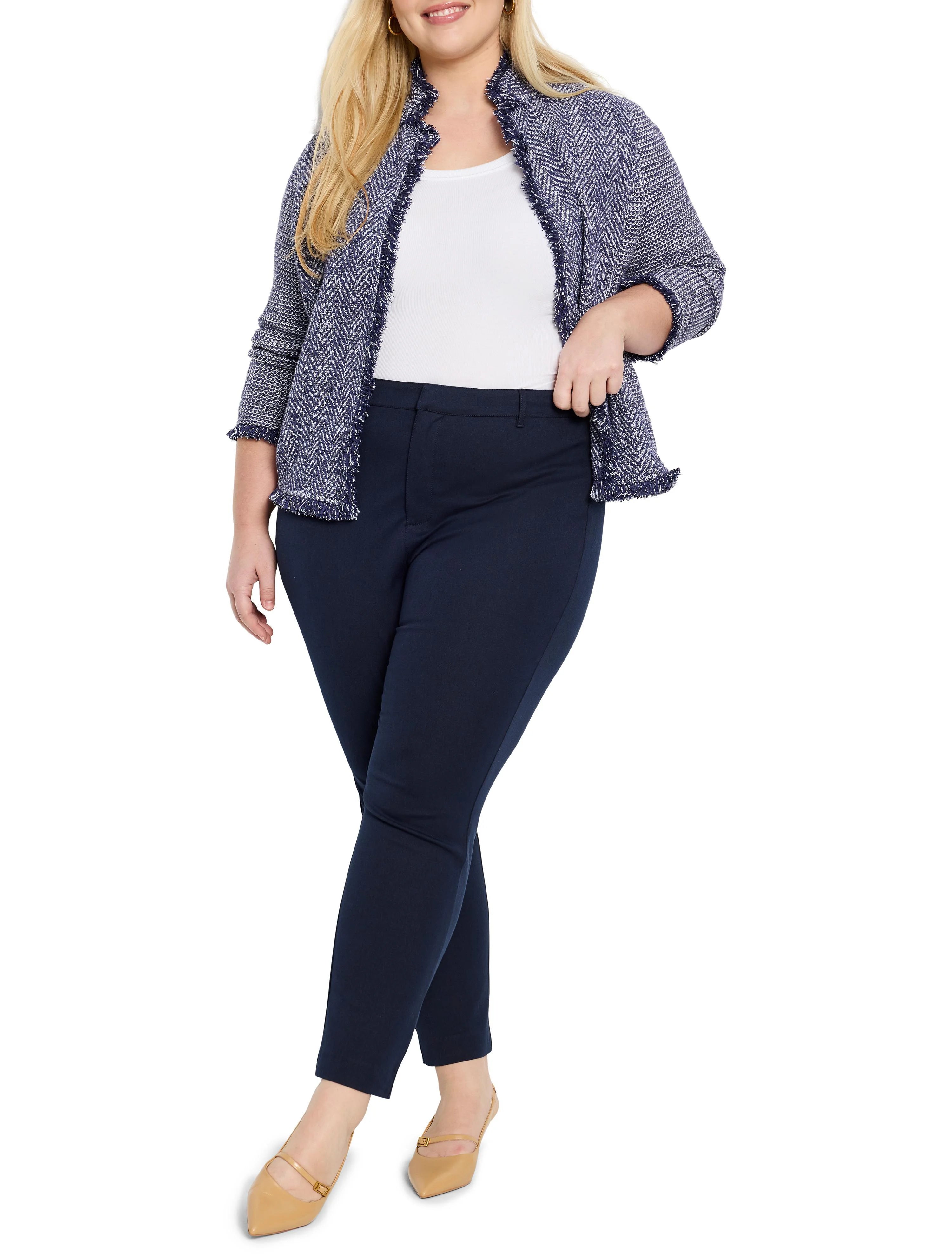 Navy blue and white herringbone knit jacket with fringe trim. Notch collar.