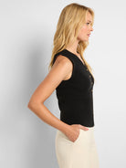 Black ribbed sleeveless sweater vest with gold buttons, V-neck.