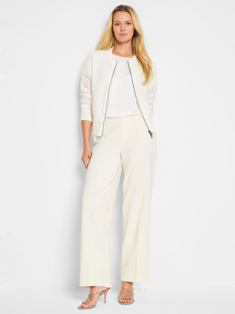 Off-white sheer knit cardigan, zipper front, textured stitch pattern.