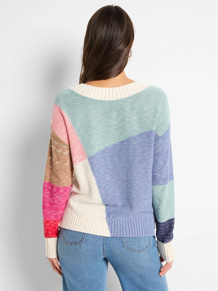 Color-blocked knit sweater. Cream, pale pink, light blue, lavender, and brown sections. Long sleeves, ribbed cuffs and hem.