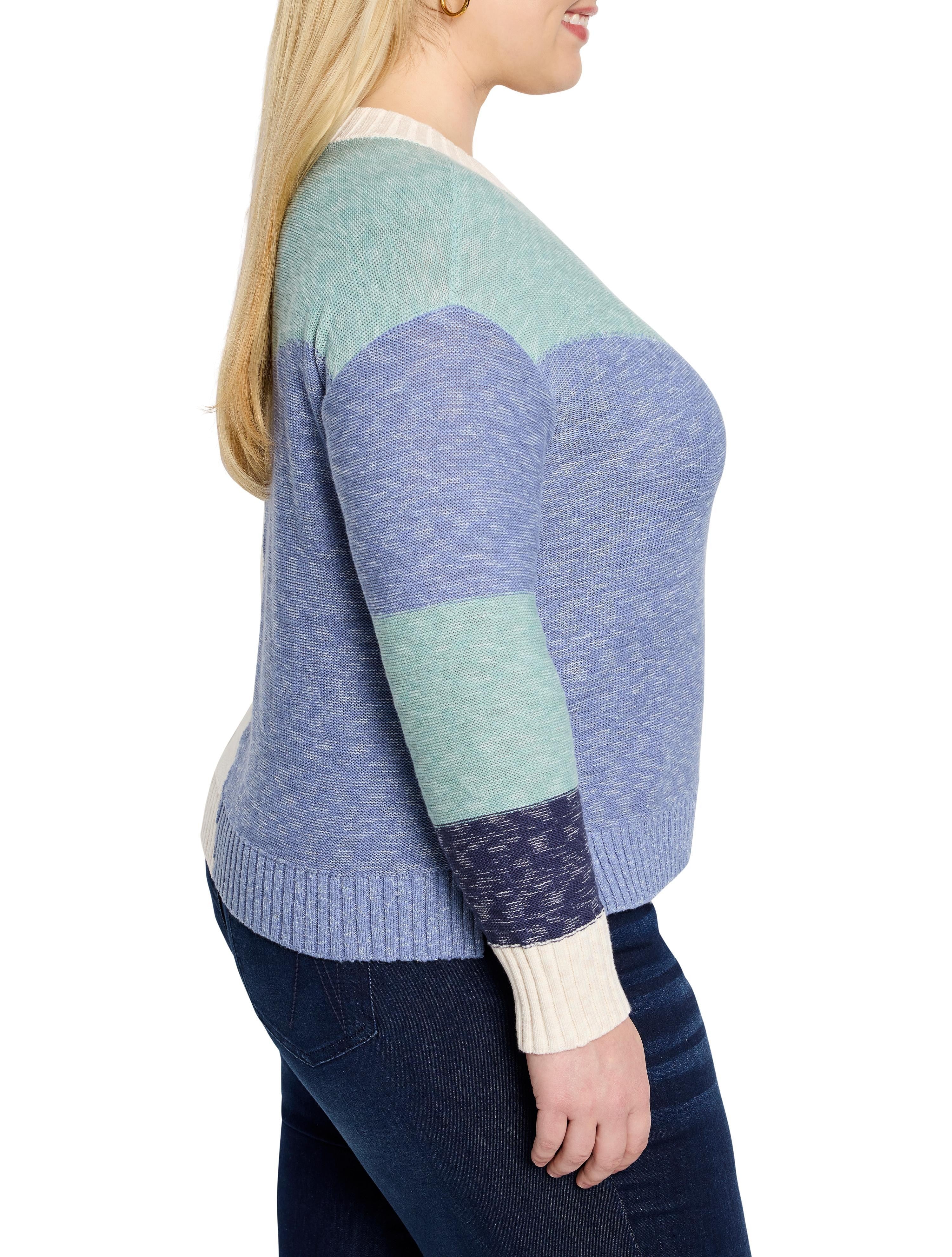 Horizontal stripes: pale mint, periwinkle blue, navy blue, and off-white. Knit sweater.