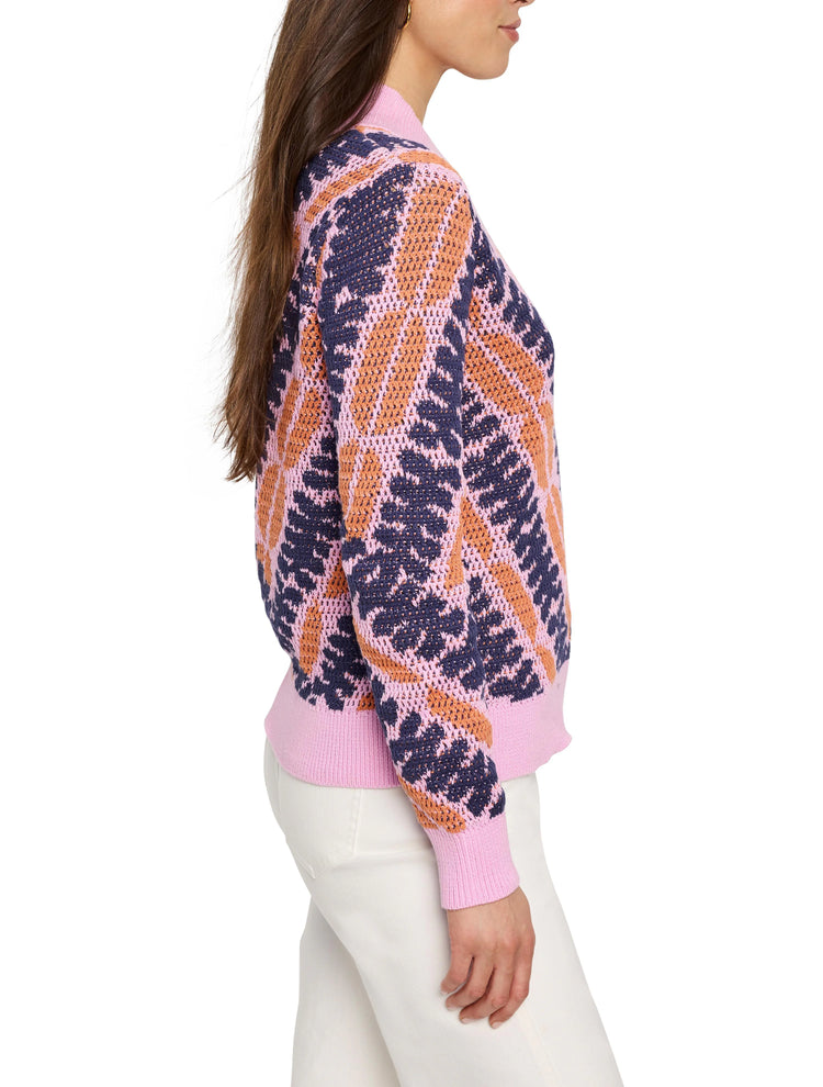 Pink sweater with navy and orange squiggle pattern. Jacquard mesh knit.