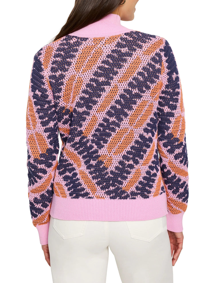 Pink, orange, and navy squiggle pattern jacquard knit sweater. Mock neck, long sleeves, and ribbed hem.