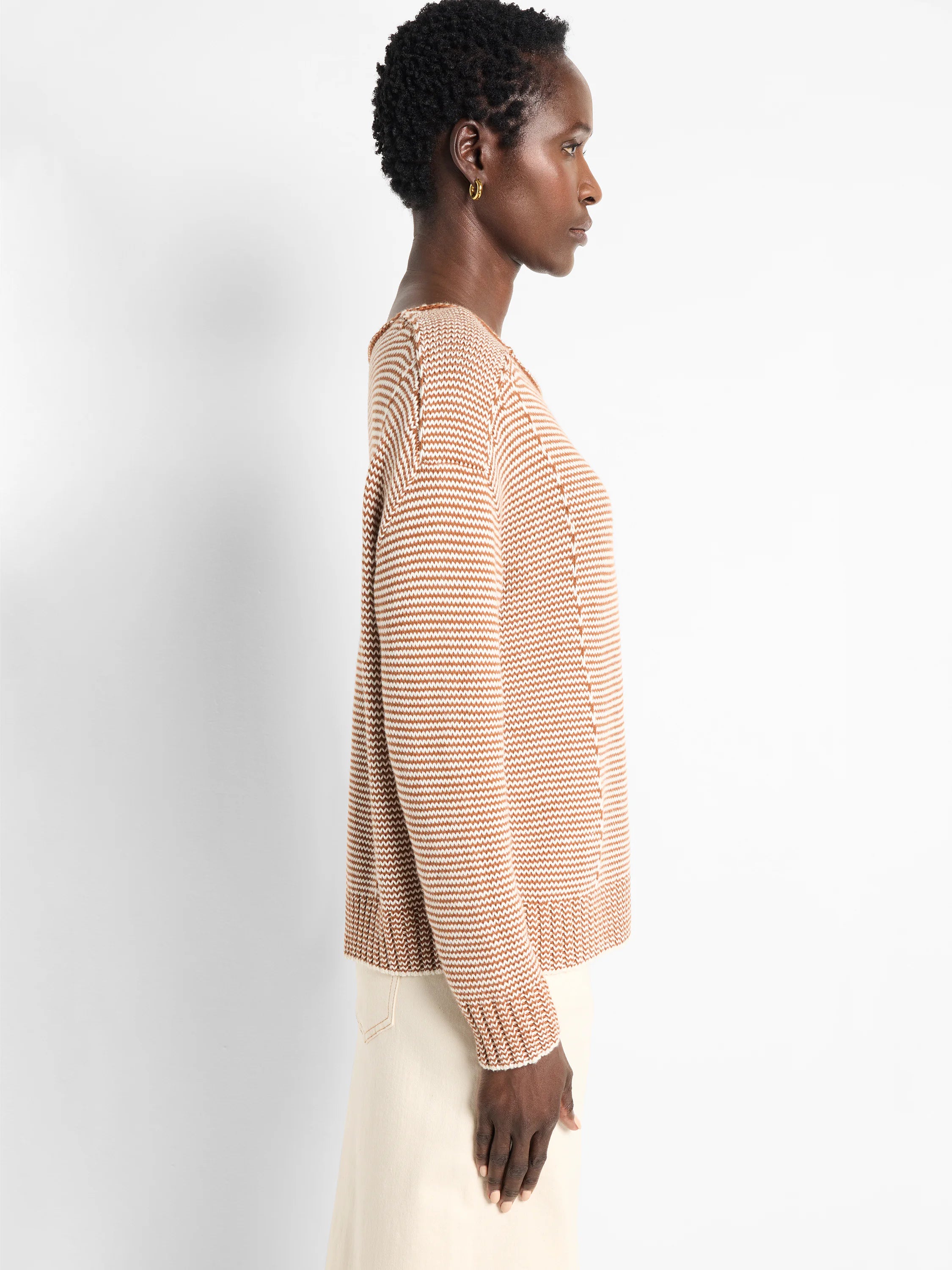 Brown and cream striped cotton sweater.  Long sleeves, ribbed cuffs and hem.  Seamed detailing at shoulders.