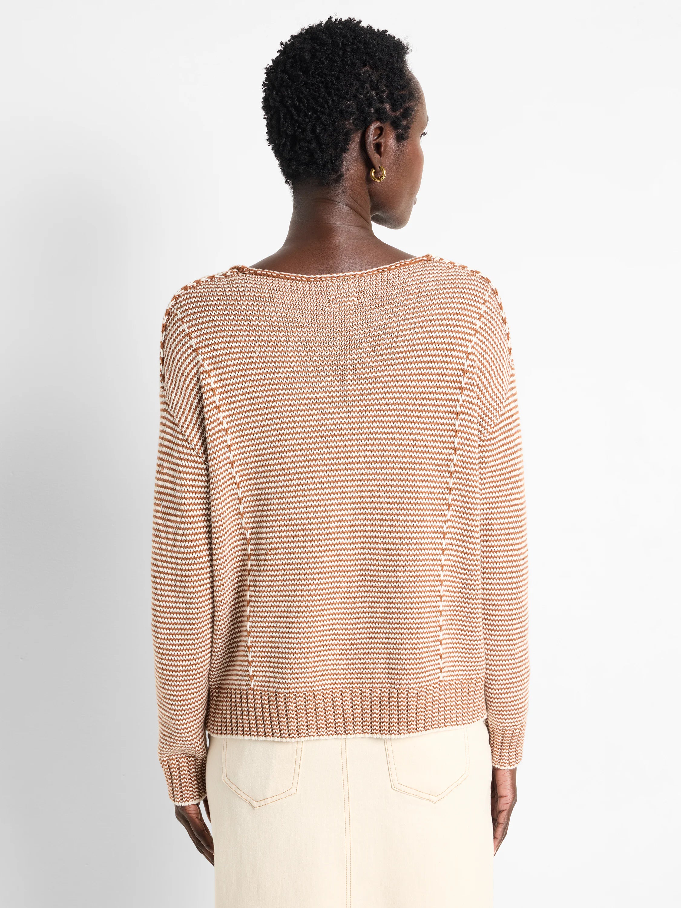 Brown and cream horizontally striped cotton sweater.  Seamed detail at shoulders and sides.  Long sleeves, V-neck.