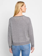 Cream and navy striped cotton sweater.  Seams at shoulders and sides. Long sleeves, ribbed cuffs and hem.