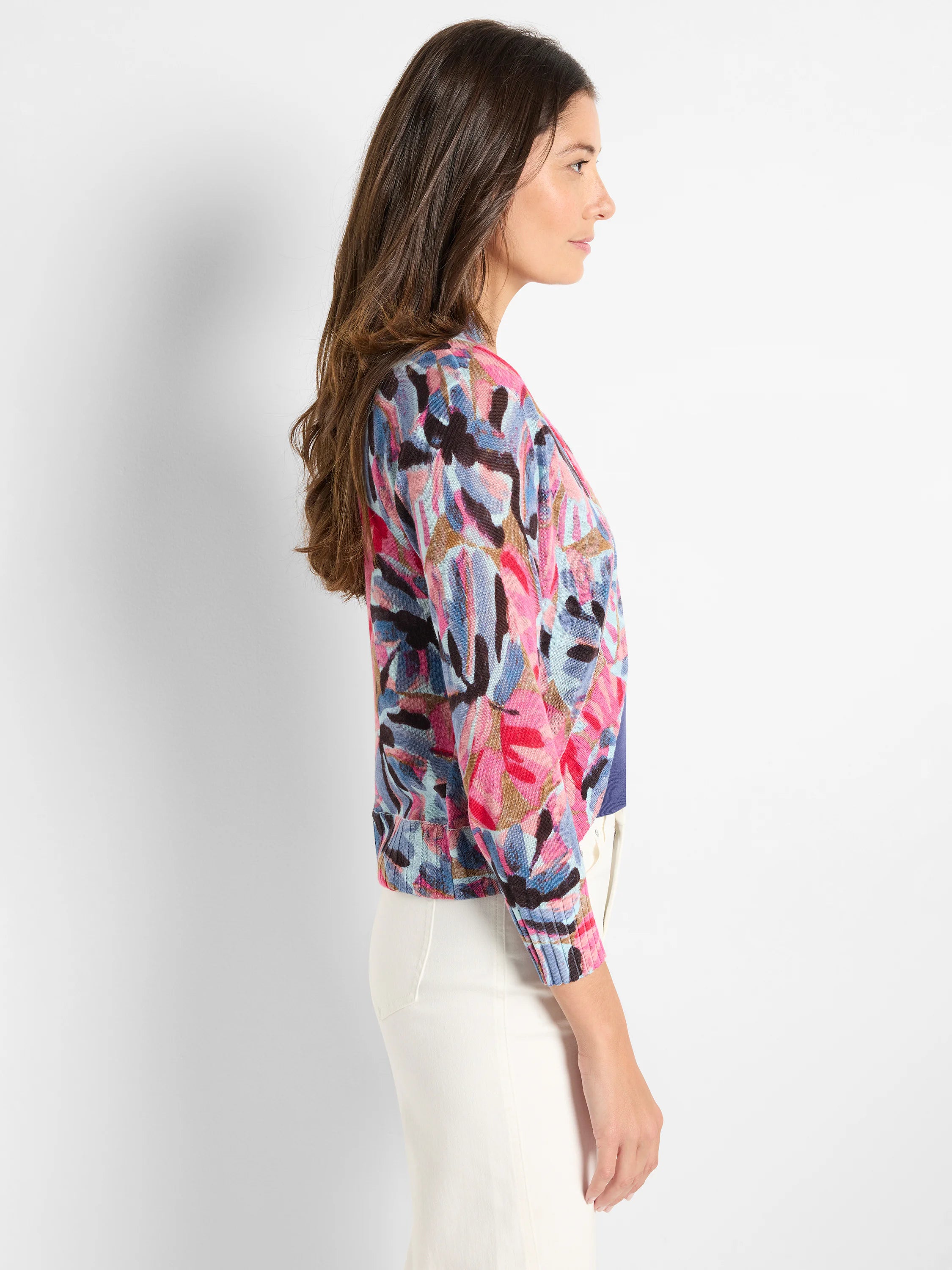 Bolero cardigan with abstract pink, blue, and brown floral pattern on a light blue background.  Three-quarter sleeves,...