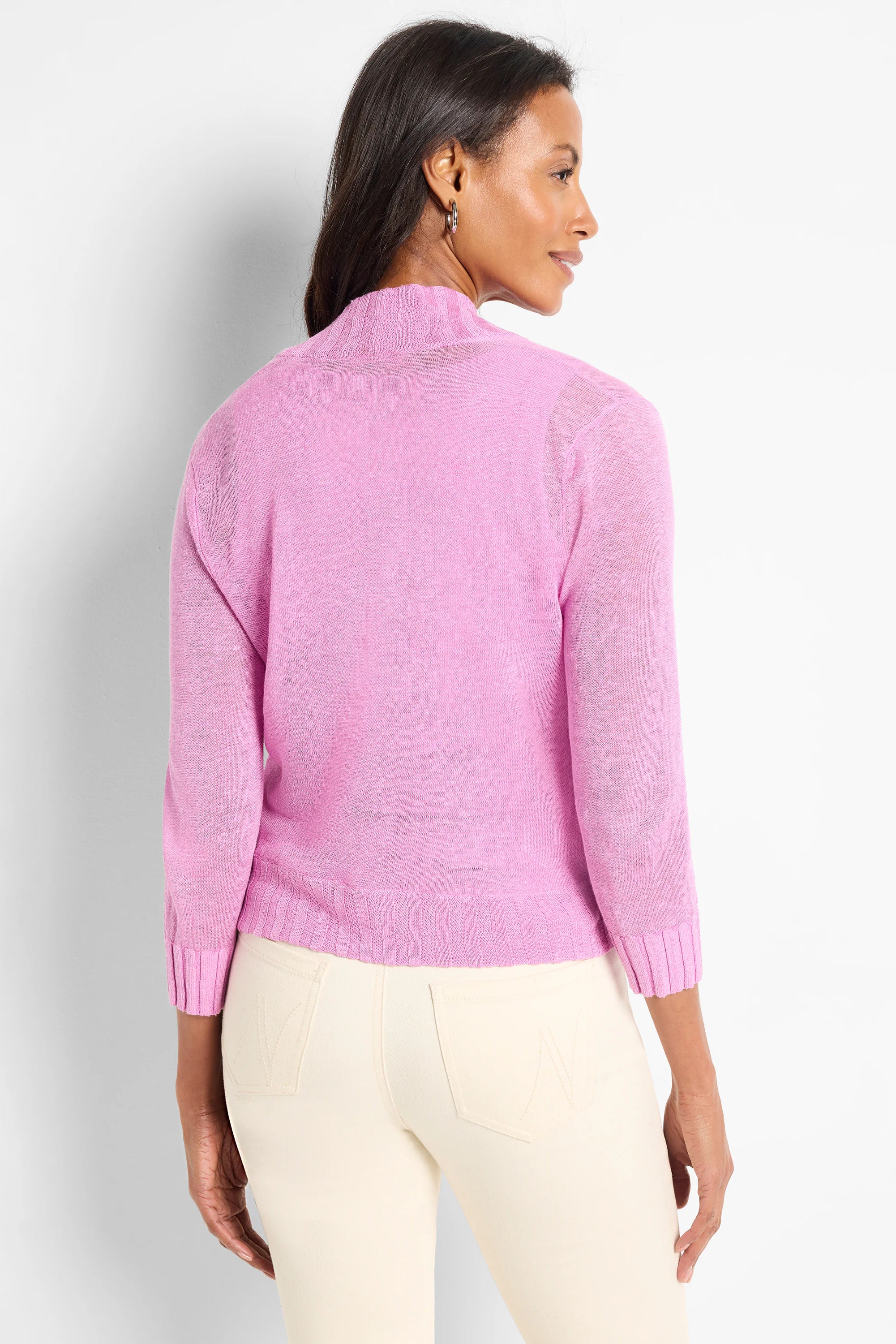 Pink, lightweight bolero cardigan with a mock neck, 3/4 sleeves, and ribbed cuffs and hem.