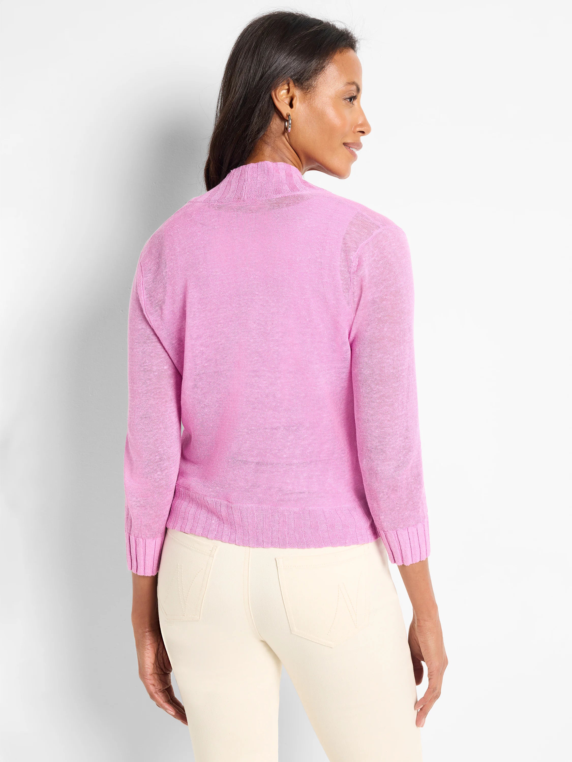 Pink, lightweight bolero cardigan with a mock neck, 3/4 sleeves, and ribbed cuffs and hem.