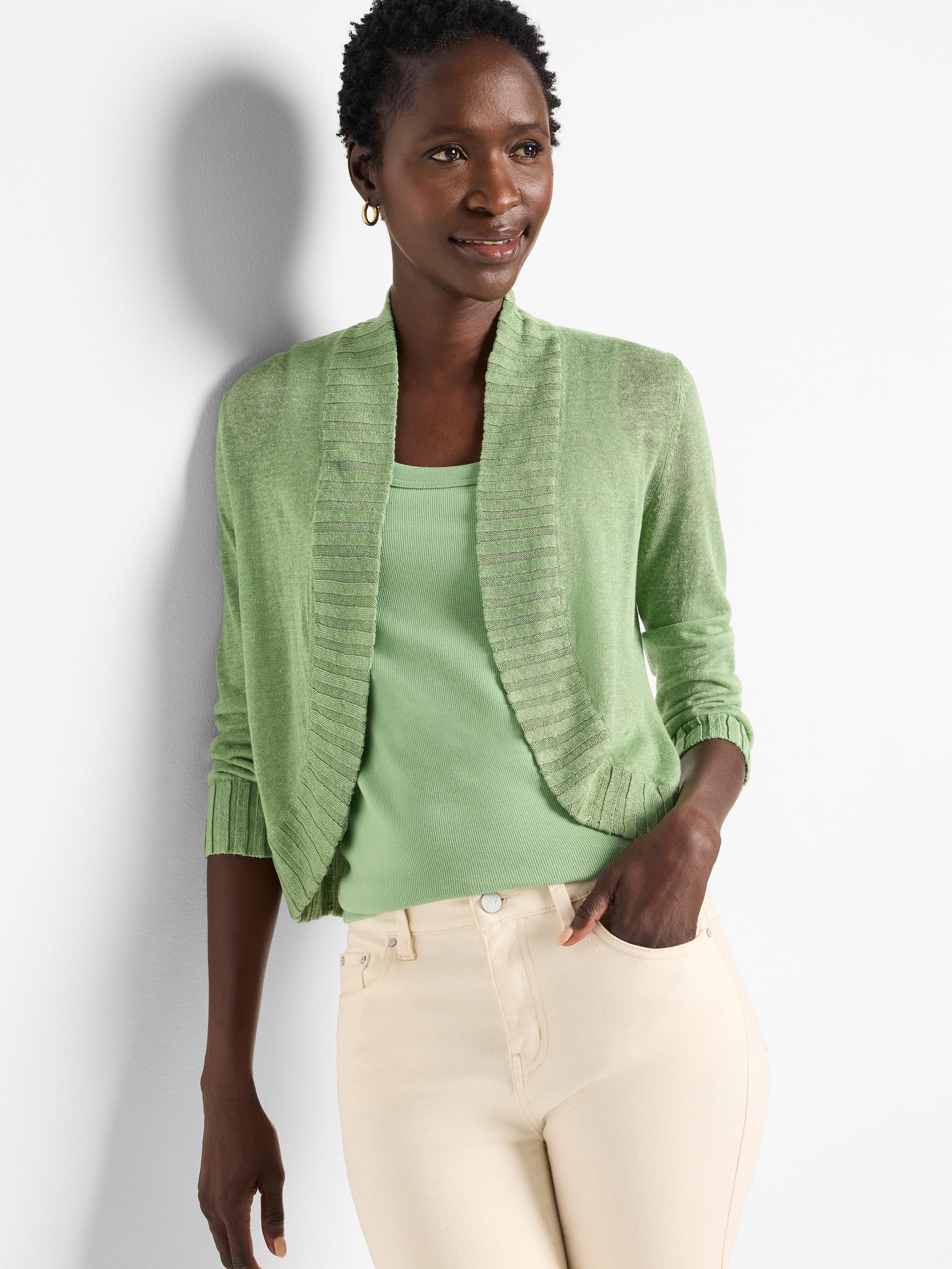 Pale green bolero cardigan with 3/4 sleeves, open front, and ribbed shawl collar & cuffs.