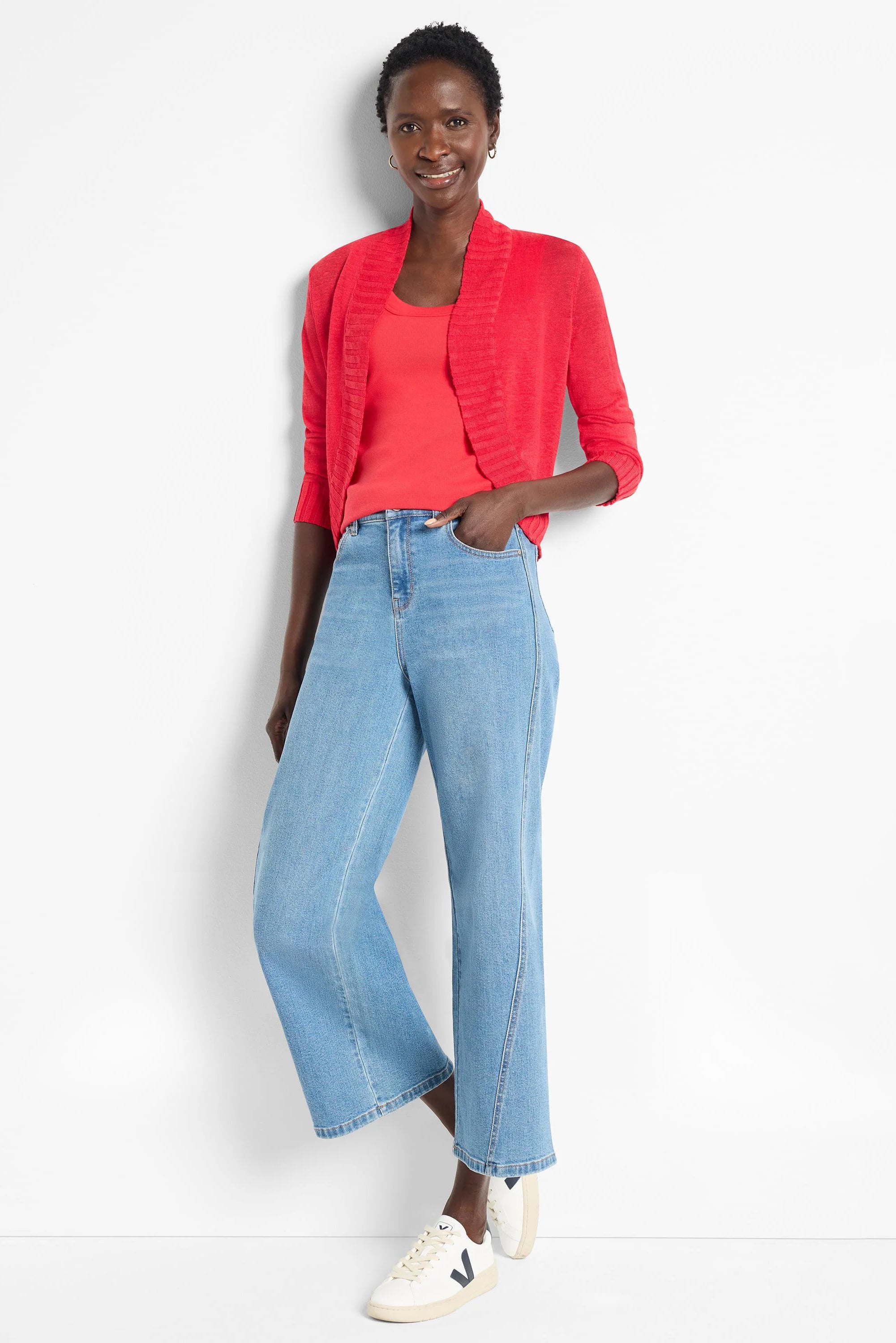 Red open-front bolero cardigan with long sleeves and ribbed texture.