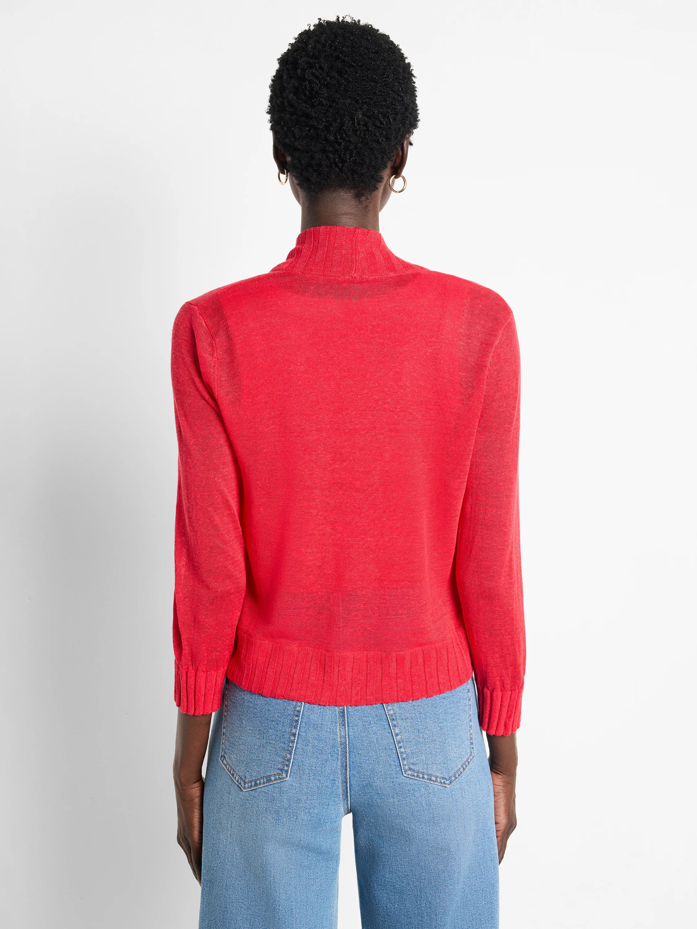 Red knit bolero cardigan, mock neck, 3/4 sleeves, ribbed hem, cropped, shown from back.