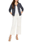 Navy and white woven sweater jacket with scalloped white trim and gold buttons. Collarless style.