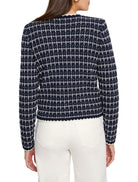Navy and white tweed-knit sweater jacket with a grid pattern and white scalloped trim. Back view.