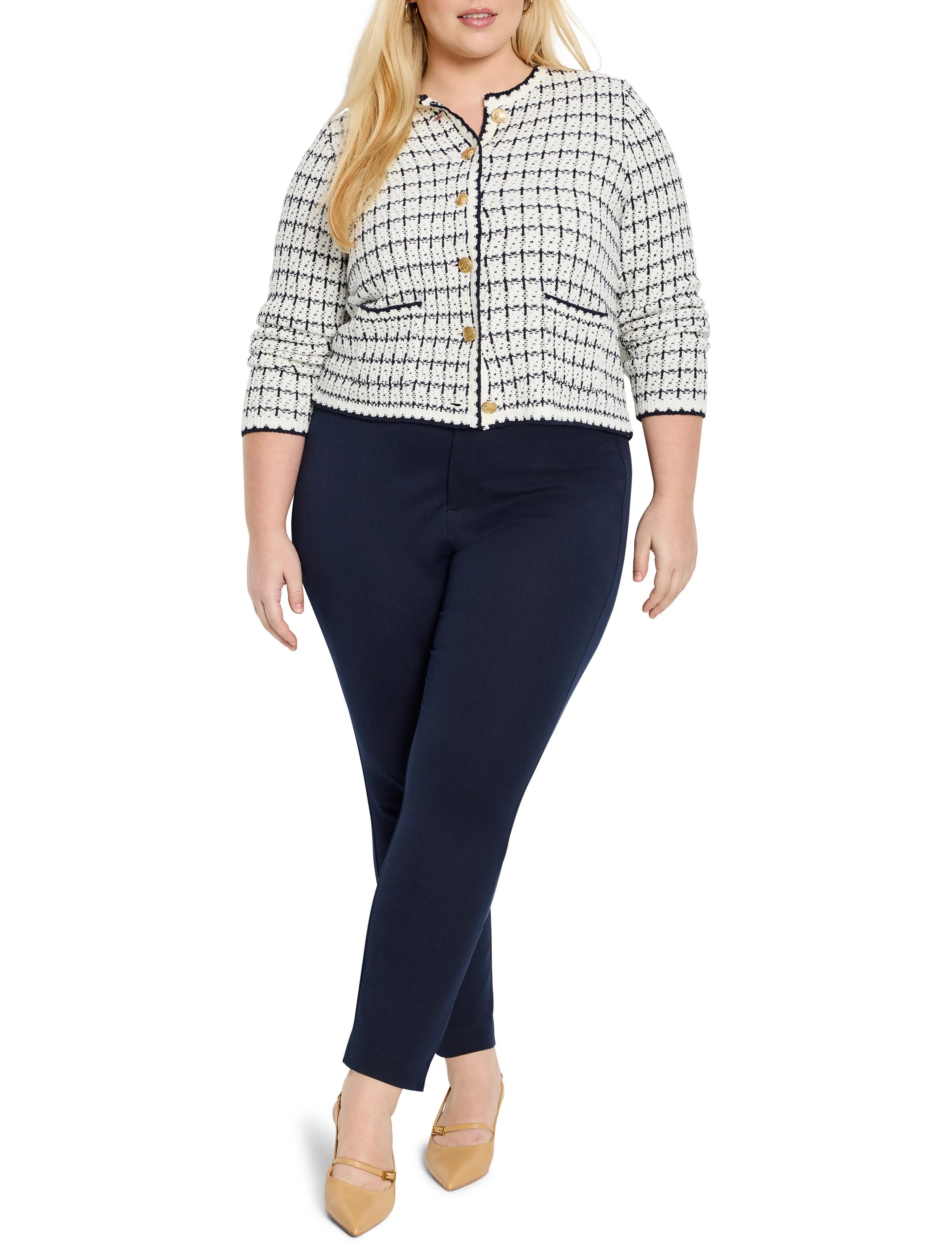 Cream and navy textured sweater jacket with a grid pattern, gold buttons, navy trim, round neck, and 3/4 sleeves.