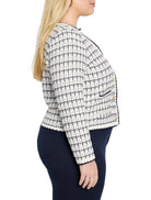 Off-white & dark navy grid sweater jacket with a round neck, gold buttons, and navy trim.