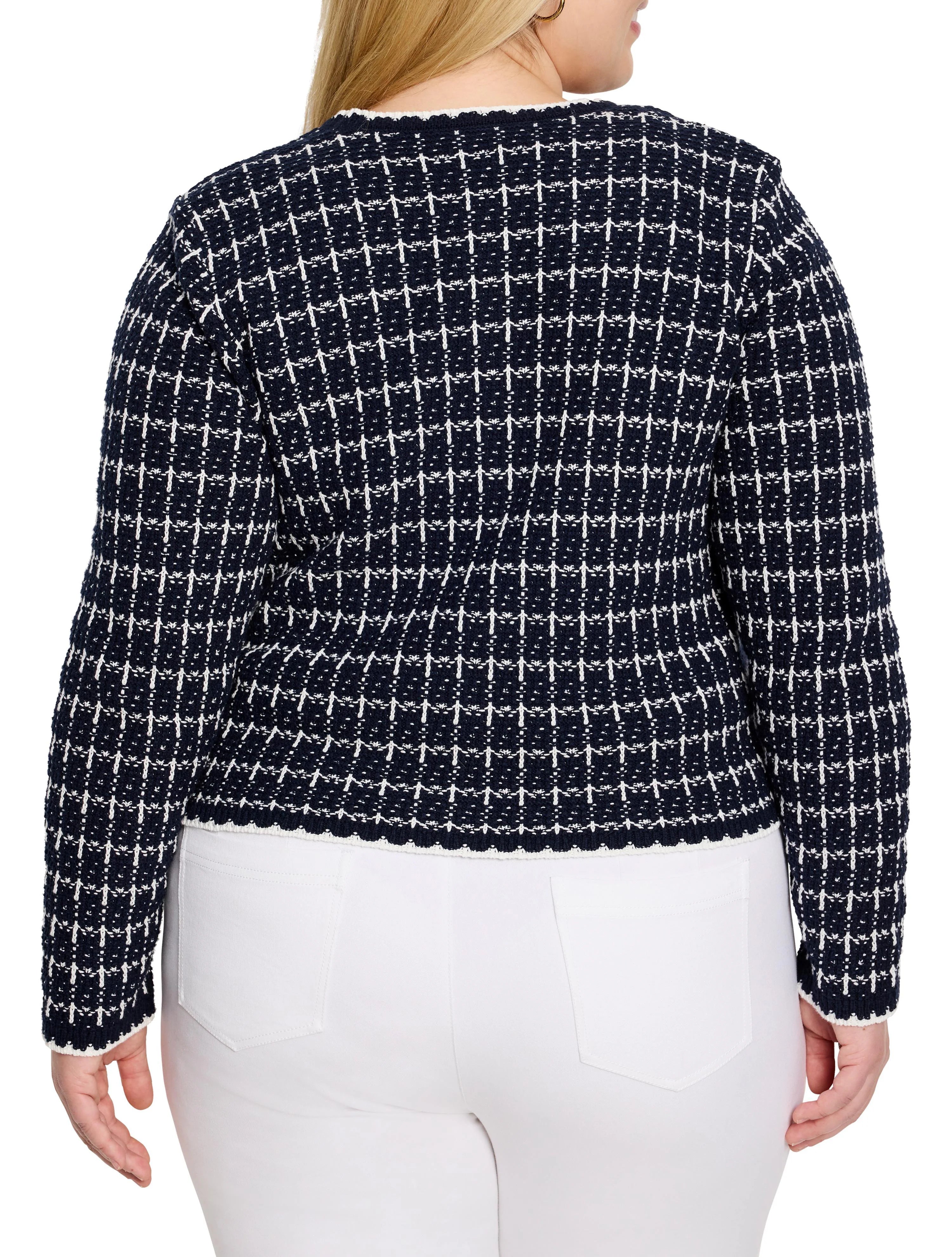 Navy & white knit sweater jacket, textured grid pattern. Scalloped white trim at neck, hem, cuffs. Back view.